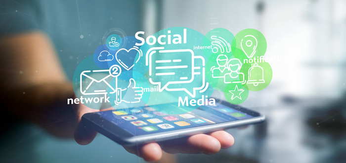 A lawyer holding a cloud of social media network